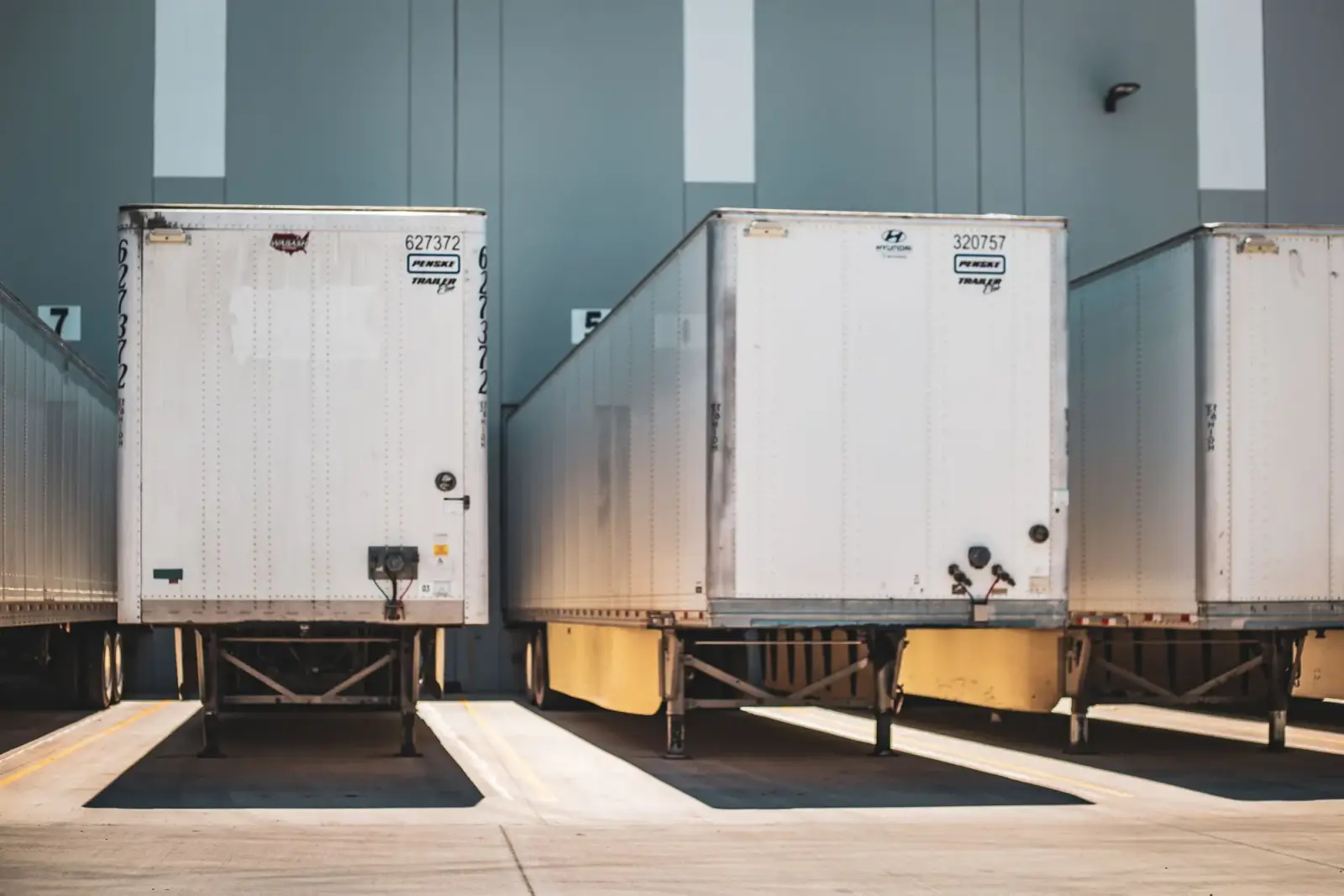 Freight trailers at the loading docks of a distribution center